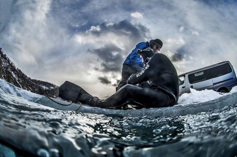 Scuba diver on the ice, Lake Baikal, Olkhon Island, Pribaikalsky National Park, Irkutsk Province,