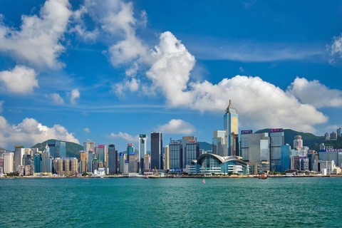 HONG KONG, CHINA, MAY 1, 2018: Hong Kong skyline cityscape downtown skyscrapers over Victoria