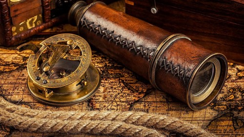Travel geography navigation concept background, panorama of old vintage retro compass with sundial,