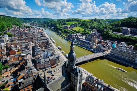 Aerial view of Dinant town, Collegiate Church of Notre Dame de Dinant, River Meuse and Pont Charles