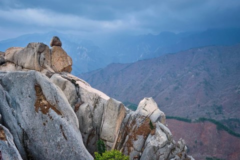 View of stone and rock formations from Ulsanbawi rock peak in stormy weather. Seoraksan National
