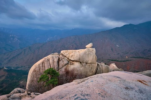 View of stone and rock formations from Ulsanbawi rock peak in stormy weather. Seoraksan National