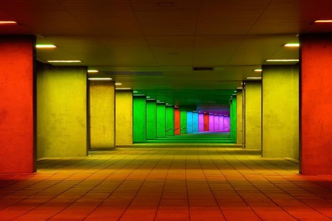 Colorful mulitcolord illuminated gallery tunnel rainbow passage under NAI building, Nederlands