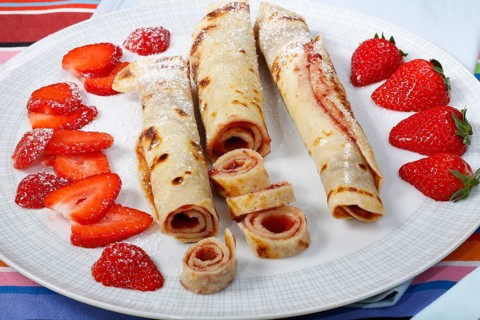 Swabian cuisine, filled pancakes, Flädle with strawberry jam and icing sugar, Gsälz, fresh