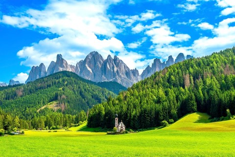 Scenic summer view of the idyllic alpine valley of val di funes with st. Magdalena church and the
