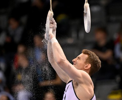 Nils Dunkel GER prepares rings with magnesia Gymnastics, EnBW DTB-Pokal, Porsche-Arena, Stuttgart,