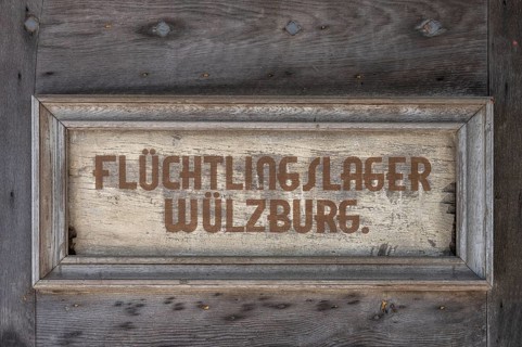 Sign at the entrance gate of Wülzburg Castle, reminder of the refugee camp from 1952 to 1968,