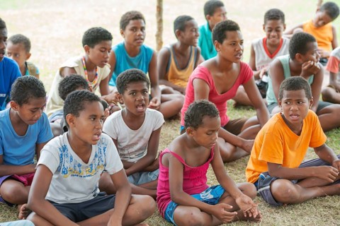 Kids in an outdoor school, Yasawa islands, Fiji, Oceania