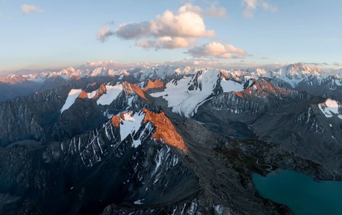 Evening mood, mountain panorama, aerial view, 4000 metre peak with glacier, mountain pass and