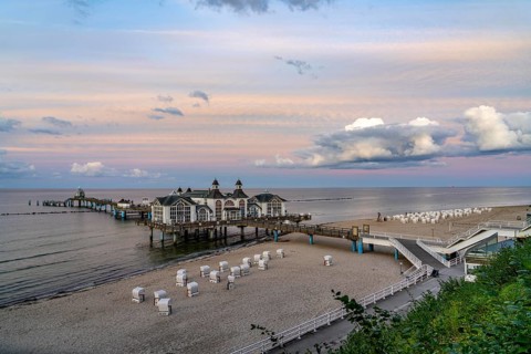 The pier of Sellin, evening mood, sunset, 394 metres long, with restaurant, jetty, beach chairs,