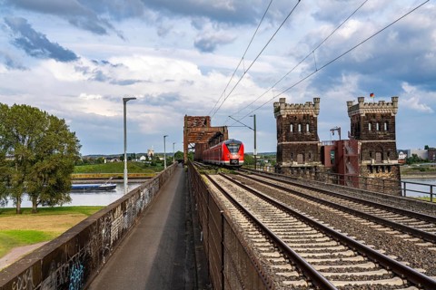 The railway bridge Duisburg-Hochfeld-Rheinhausen, over the Rhine, regional trains and many goods