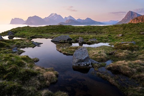 Landscape at Stornappstinden mountain. Foothills of a stream in the foreground. View of the