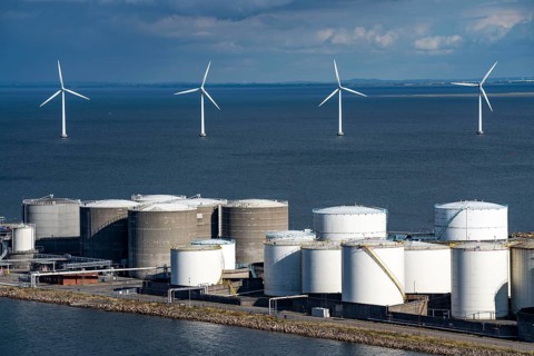 Wind turbines, offshore wind farm east of Copenhagen, in Øresund, tank farm in Prøvestenen harbour,