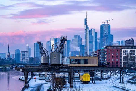 The skyline of Frankfurt am Main, skyscrapers of the banking district, historic harbour cranes at