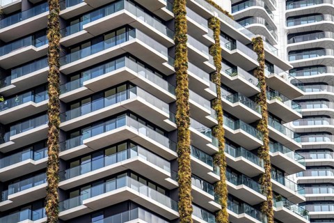 Facade of the Eden Tower on Europa-Allee in Frankfurt am Main, green facade, residential building,