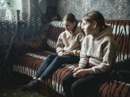 Sveta and Ira in their family home in Voloska Balakliia. The village is close to the front line,