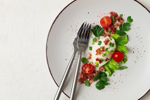 Poached egg, with bacon and vegetables, breakfast, homemade