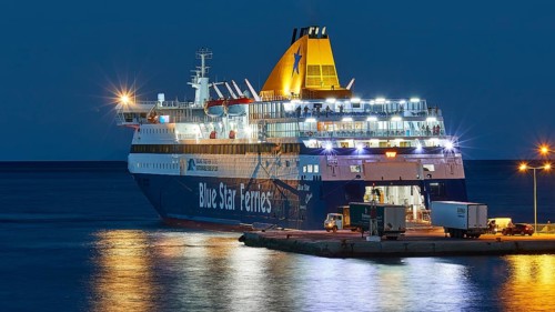 Large illuminated ferry in the harbour at night, Pigadia, town and harbour, Bluestar Chios ferry at