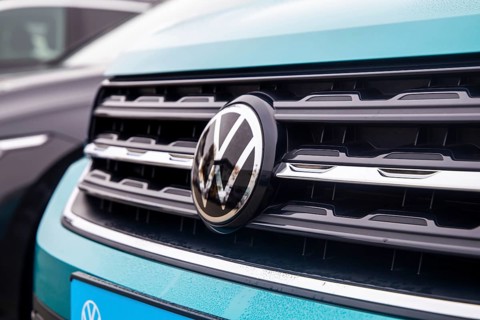 Close-up of vehicles from the car manufacturer VW in a car dealership