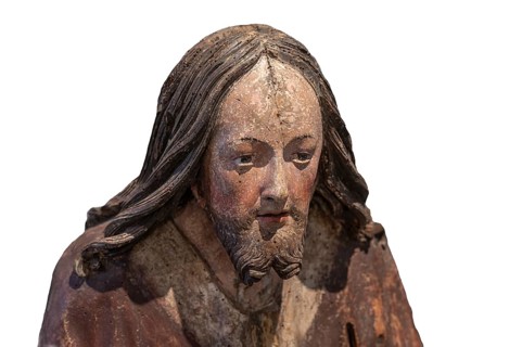 Head of Christ, detail of the Palmesel, wooden figure around 1520, on a white background, Diözesan