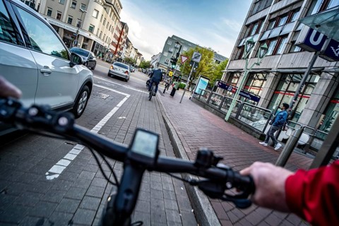 Cycling in the city, city centre road, cycle lane, bikes have right of way, 30 km/h zone, traffic