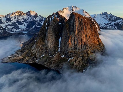 Aerial view, steep mountains, coast, winter, fog, morning light, Reine, Moskenesoya, Lofoten,