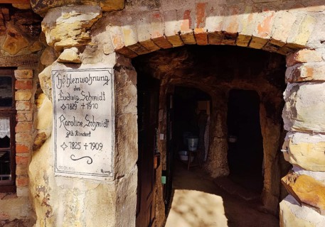 Sign at the entrance to the Schmidthöhle cave, Langenstein cave dwellings, district of Halberstadt,