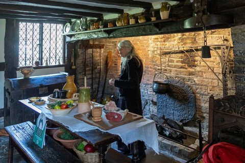 Interior view, kitchen, fireplace, table, food, museum guide, Anne Hathaway's Cottage, Shottery,
