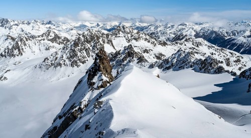 View of mountain panorama in winter on Piz Kesch with glacier Vadret da Porchabella, high tour, ski