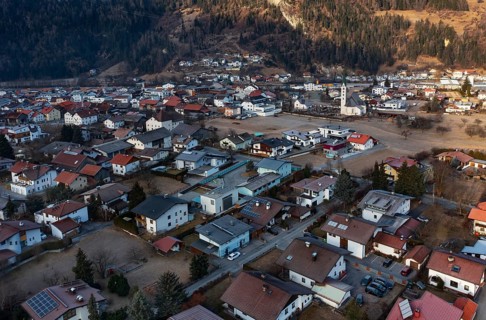 Drone shot, view of village with parish church, Prutz, Kaunertal, Inntal, Tyrol, Austria, Europe