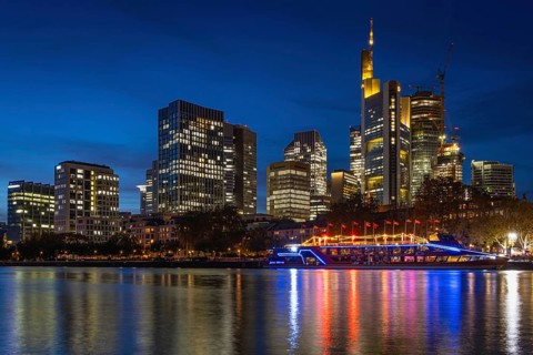 The Kansas City Chiefs' NFL boat is anchored on the River Main in front of Frankfurt's banking