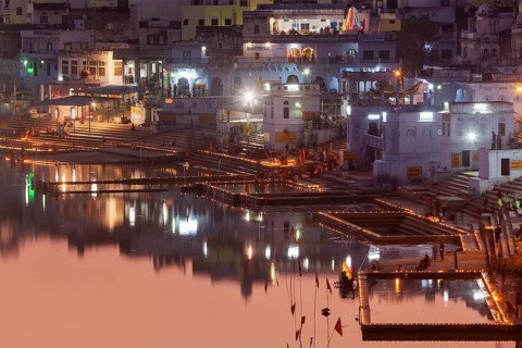 PUSHKAR, INDIA, NOVEMBER 21, 2012: Sacred Puskhar Sagar lake and ghats of Pushkar in twilight in