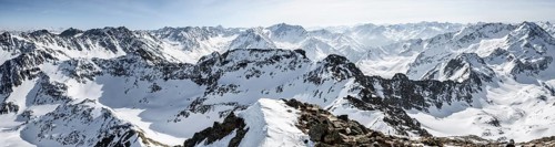 Snow-covered mountain panorama from the summit of the Sulzkogel, view of the peaks of the Stubai