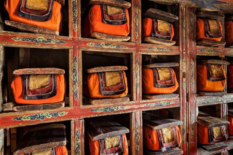 Folios of old manuscripts in library of Thiksey Gompa (Tibetan Buddhist Monastery) . Ladakh, India,