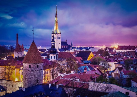 Vintage retro effect filtered hipster style image of Tallinn Medieval Old Town illuminated in