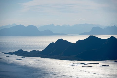 Mountain peak and fjord Austensfjorden, fjord landscape and sea, view from the summit of