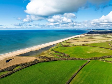 Farms over Swyre and West Bexington from a drone, West Bexington Nature Reserve, S W Coast Path,