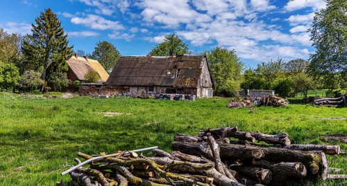Abandoned and derelict farmhouses on undeveloped land in Rügen, Mecklenburg-Vorpommern, Germany,