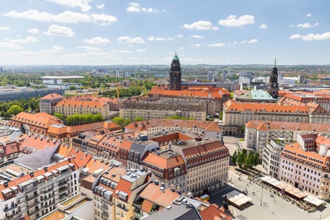 View from the tower of the Church of Our Lady over the roofs of the old town with the town hall