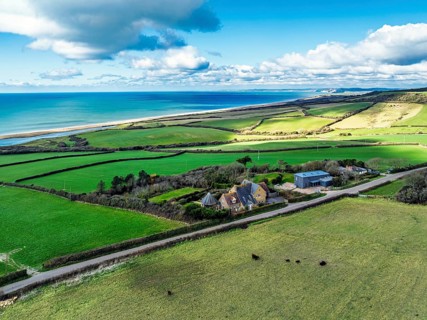 Farms over Swyre and West Bexington from a drone, West Bexington Nature Reserve, S W Coast Path,