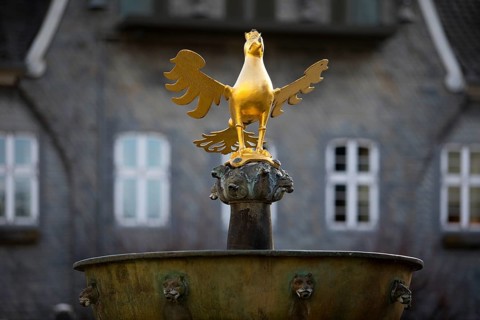 Gilded imperial eagle as a fountain eagle on the market fountain, Old Town, Goslar, UNESCO World