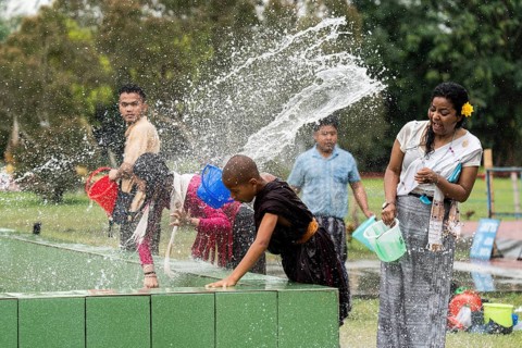 NAMSAI, INDIA.- APRIL 16: Devotees celebrate the vibrant Sangken Festival by pouring water over