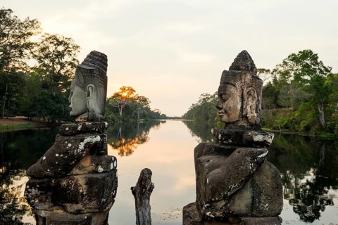 Figures on the bridge to Angkor Thom, sunset, Angkor Wat, Angkor, UNESCO World Heritage Site, Siem