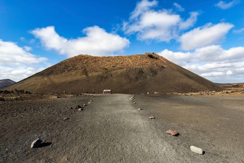 Hiking trail to the volcanic crater Caldera de Los Cuervos, cinder cone, Los Volcanes nature park