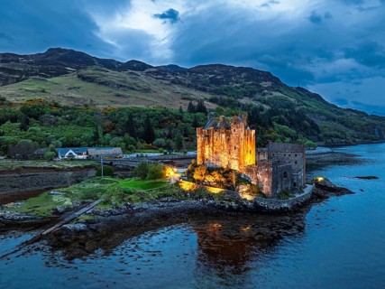 Night over Eilean Donan Castle and Loch Duich from a drone, Isle of Skye, Highlands, Scotland,