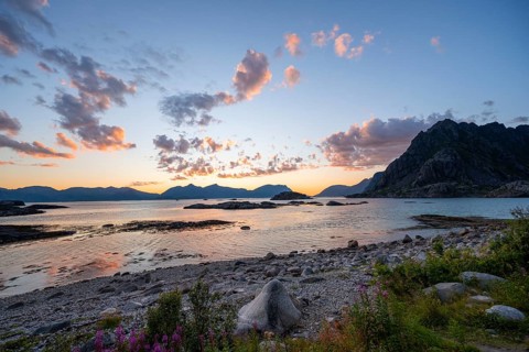 Coast with pebble beach, coastal landscape at sunset, Henningsvær, Lofoten, Nordland, Norway,