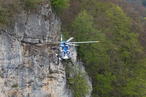 Police rescue operation. Helicopter in action at the slide rock near Bad Urach, Reutlingen