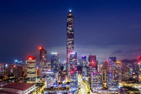 Shenzhen skyline with skyscrapers city centre downtown at night in Shenzhen, China, Asia