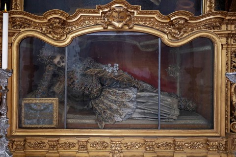 Magnificent glass shrine with decorated bones of a catacomb saint, Basilica of St Mauritius,