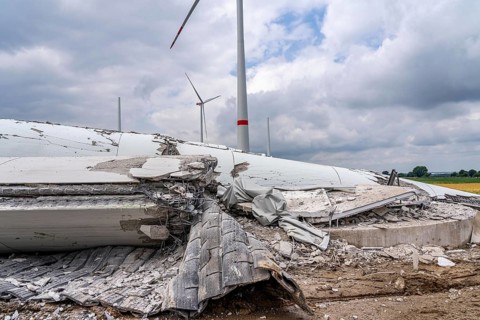 Demolished tower of a 20 year old wind turbine, in the Werl wind farm, 5 old Enercon E-66 turbines
